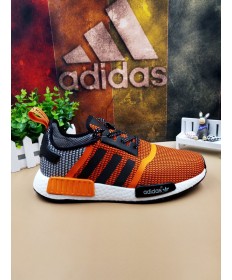 en blanco y negro de Adidas NMD Los Ángeles las zapatillas de deporte de color naranja