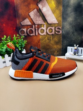 en blanco y negro de Adidas NMD Los Ángeles las zapatillas de deporte de color naranja