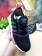 Adidas formadores NMD Moscú en blanco y negro se levantaron
