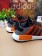 en blanco y negro de Adidas NMD Los Ángeles las zapatillas de deporte de color naranja