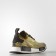 Adidas NMD Runner Primeknit formadores original en color Negro Core/Core Negro/Amarillo St Nomad
